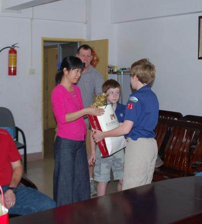 Boys donating at orphanage