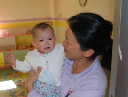 Dan-Dan with her caregiver