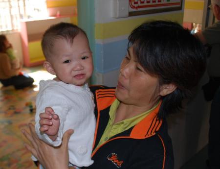 Dan-Dan with caregiver